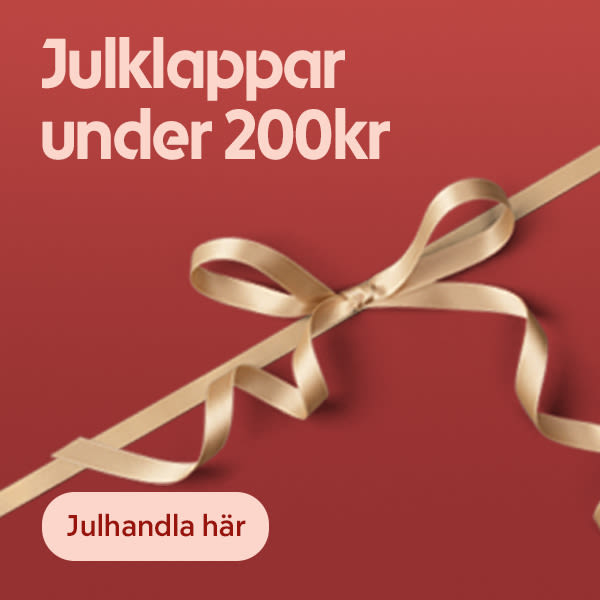 Guldig sidenrosett knuten på snedställd guldig band mot röd bakgrund med texten "Julklappar under 200kr" och knapp "Julhandla här".
